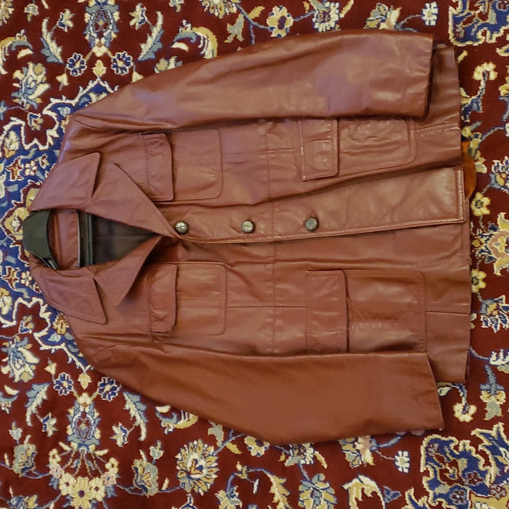 vintage leather jacket. Burgundy Red. It's size 42.